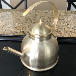 Brand new gold tea kettle